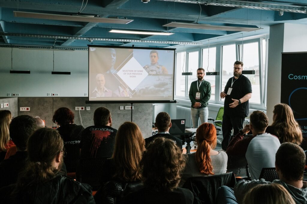 Gate 21 company members presenting the company and it's values at game dev summit held in CosmoHub coworking space in Sarajevo